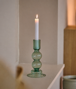 Bougeoir en verre vert